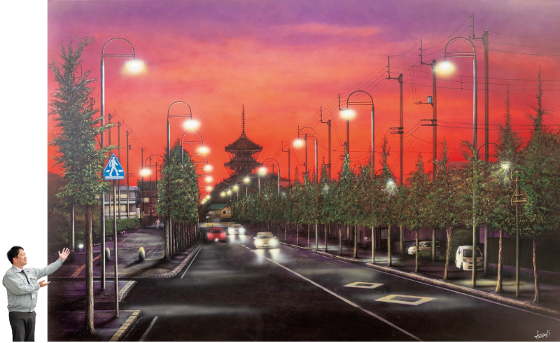 自衛隊駐屯地から善通寺に向かう町並みを描いた小林俊彦さんの黒板アート作品「善通寺夕景」