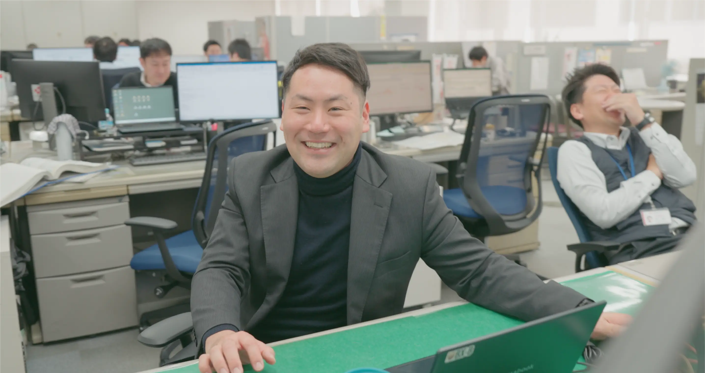 リビング営業部　亀井敬介さんの写真